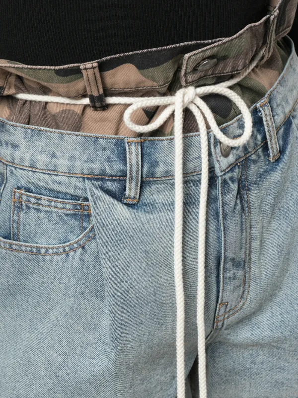 Billy the Kid ripped jeans