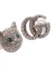 Gucci cat head GG logo earrings