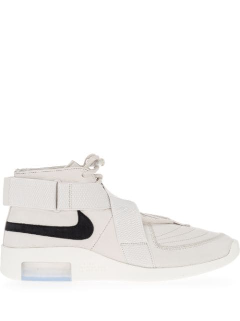 white nikes with strap