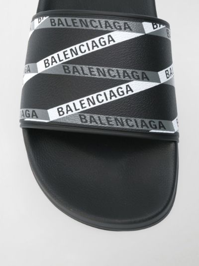 Balenciaga logo print pool slides black | MODES