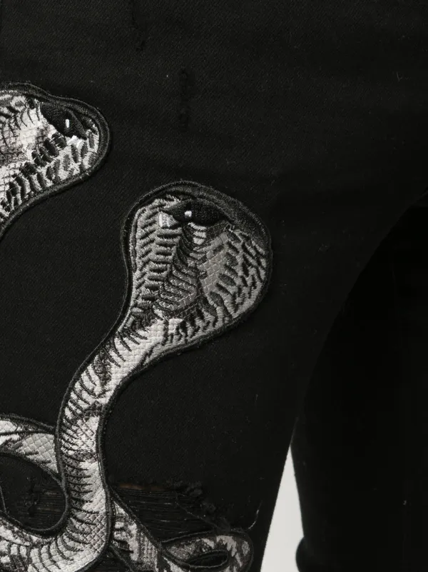 AMIRI Snake Patch Jeans - Farfetch