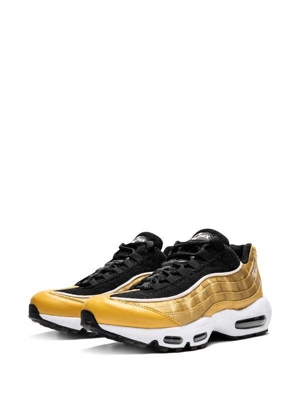 Shop gold Nike Air Max 95 LX sneakers 