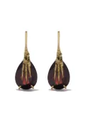 Wouters & Hendrix Gold 18kt gold garnet claw earrings