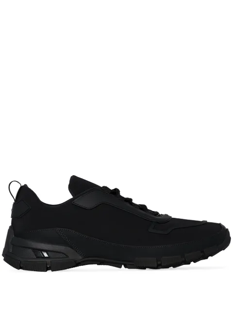 Click to view more detailed imagery on our partner's website Prada Cross Action Rubber-trimmed Nylon Sneakers In F0002 Nero