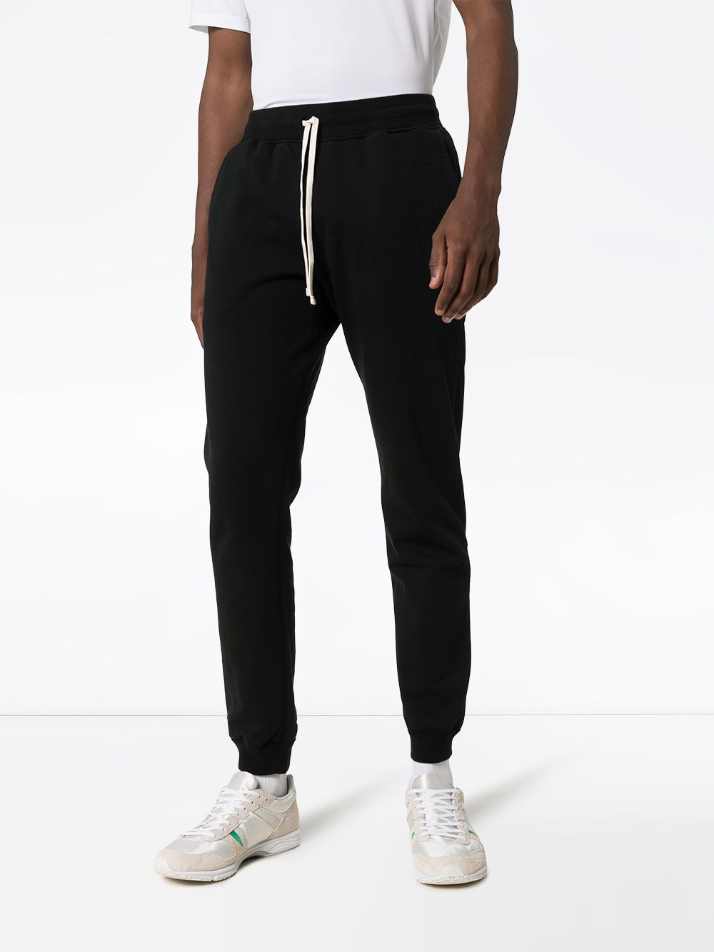 Shop Reigning Champ classic track pants with Express Delivery - FARFETCH