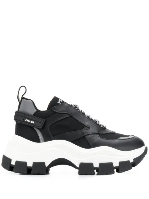 Click to view more detailed imagery on our partner's website Prada Leather And Fabric Sneakers With Maxi Sole In Black
