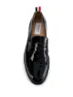 Thom Browne patent penny loafers