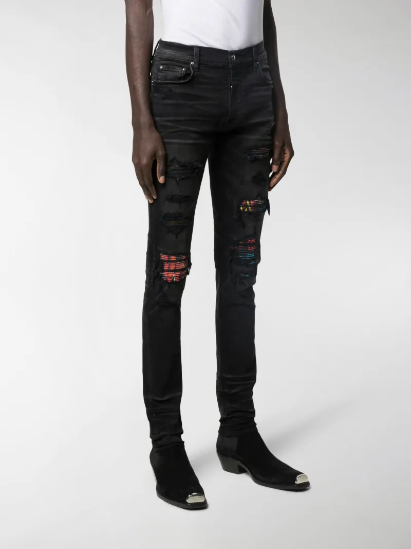 AMIRI MX1 patch distressed slim-leg 