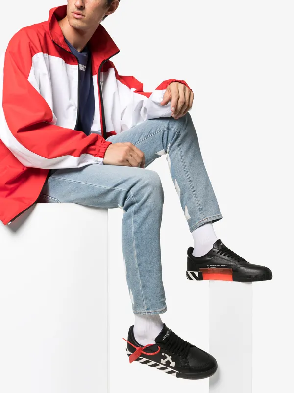 shoes with arrow logo