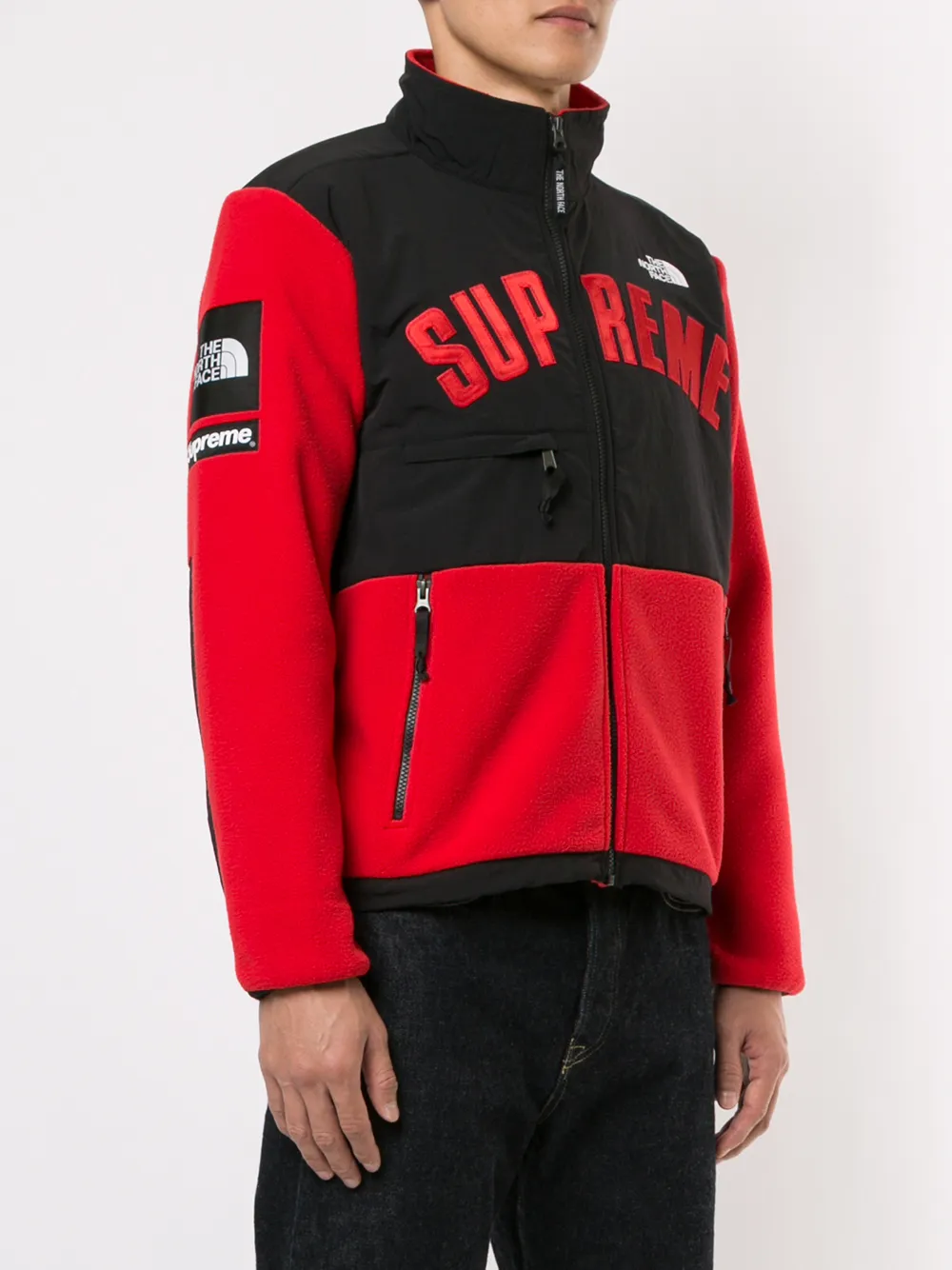 black north face jacket with red logo