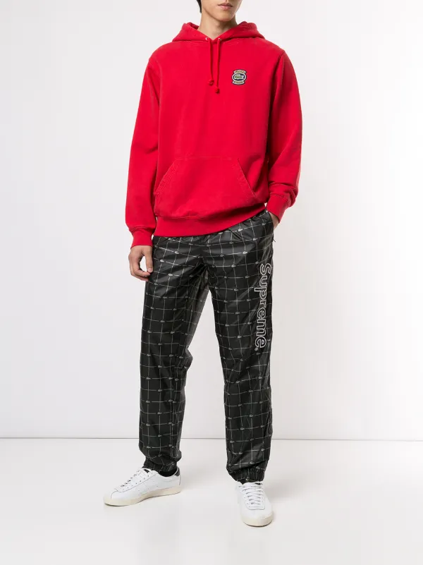 red lacoste track pants