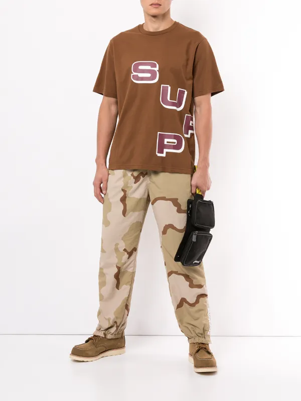 supreme warm up pants sizing