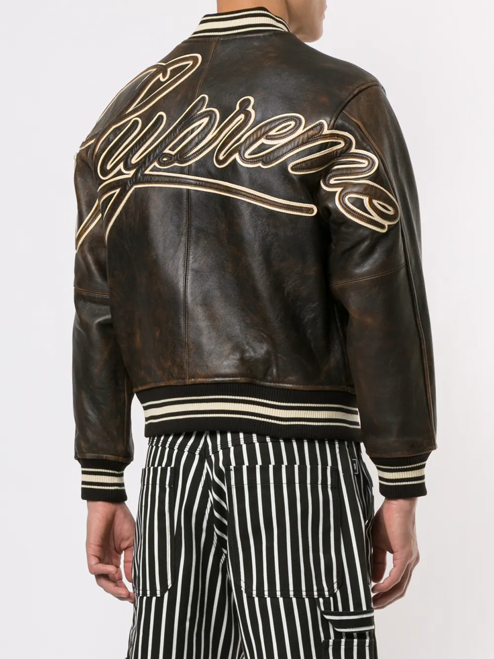 фото Supreme бомбер с эффектом потертости