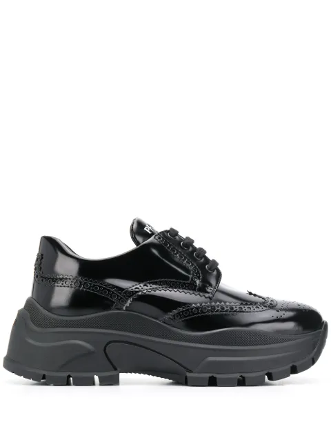 Click to view more detailed imagery on our partner's website Prada Spazzolato Leather Wingtip Sneakers In Black