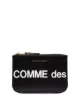 Immagine 1 di Comme Des Garçons Wallet Clutch con stampa