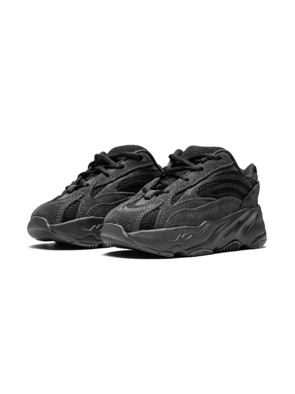 Shop black adidas YEEZY Yeezy Boost 700 