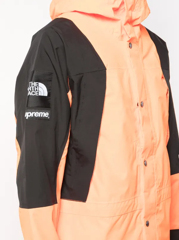 Orange north face hot sale supreme jacket