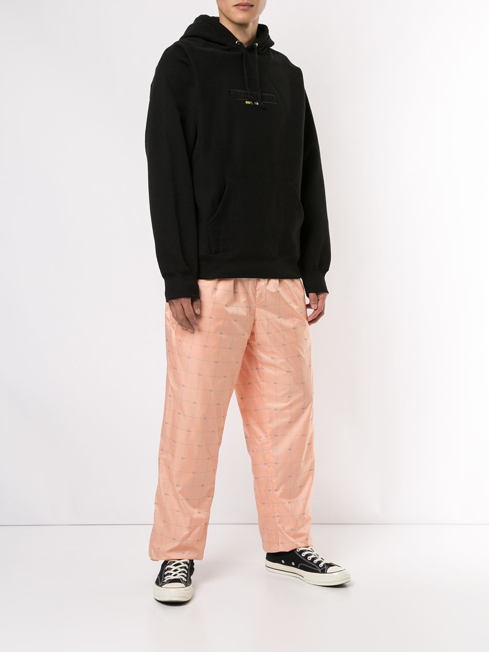 Shop Supreme logo grid tapered trousers with Express Delivery - FARFETCH