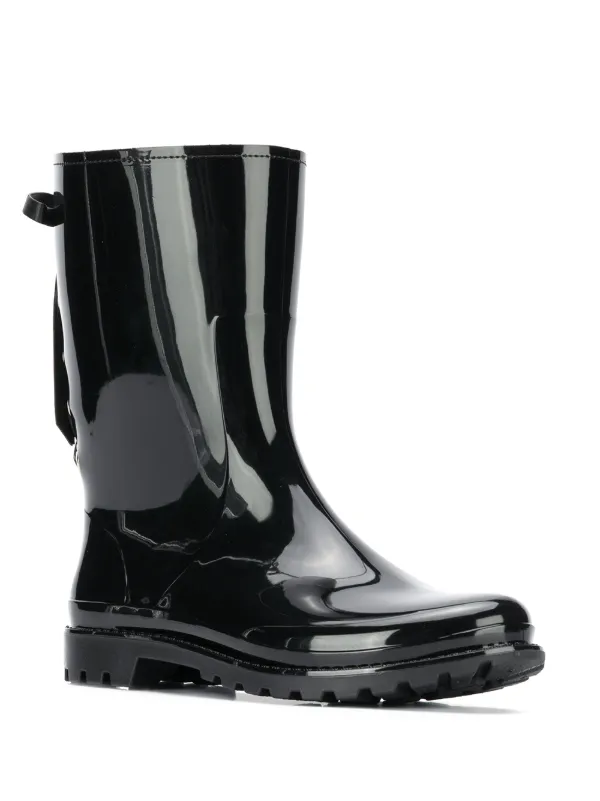 red rain boots with bow on back