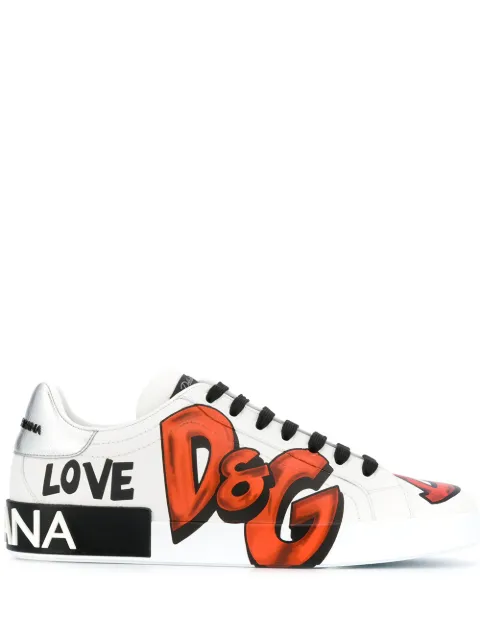 Click to view more detailed imagery on our partner's website Dolce & Gabbana Portofino Graffiti Logo-Print Low Top Sneakers In White