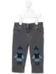 الصورة 1 من Stella McCartney Kids جينز بأبليكات صواريخ