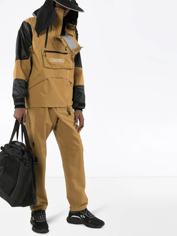 khaki and black north face jacket