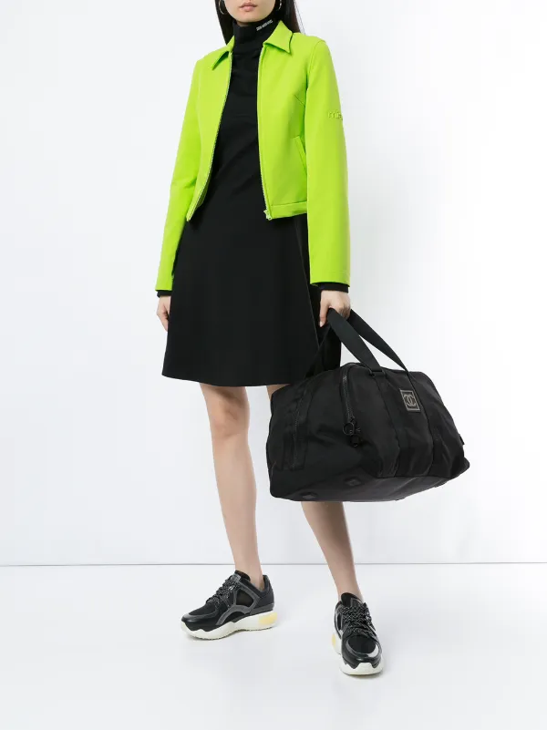 CHANEL Pre-Owned Sports Line CC Travel Bag | Black | FARFETCH