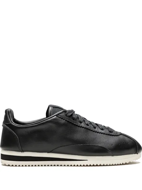 Click to view more detailed imagery on our partner's website Nike 'Classic Cortez Prem' Sneakers In Black