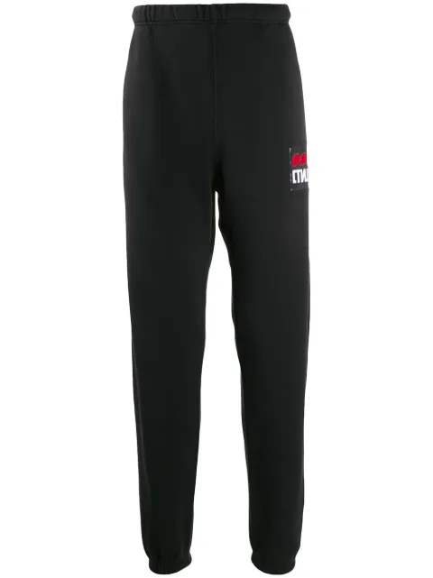Click to view more detailed imagery on our partner's website Heron Preston СТИЛЬ-appliquÉ Slim-fit Track Pants In Black
