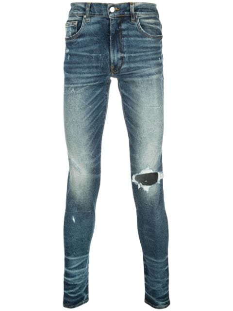 Amiri Ripped Skinny Jeans | Farfetch.com
