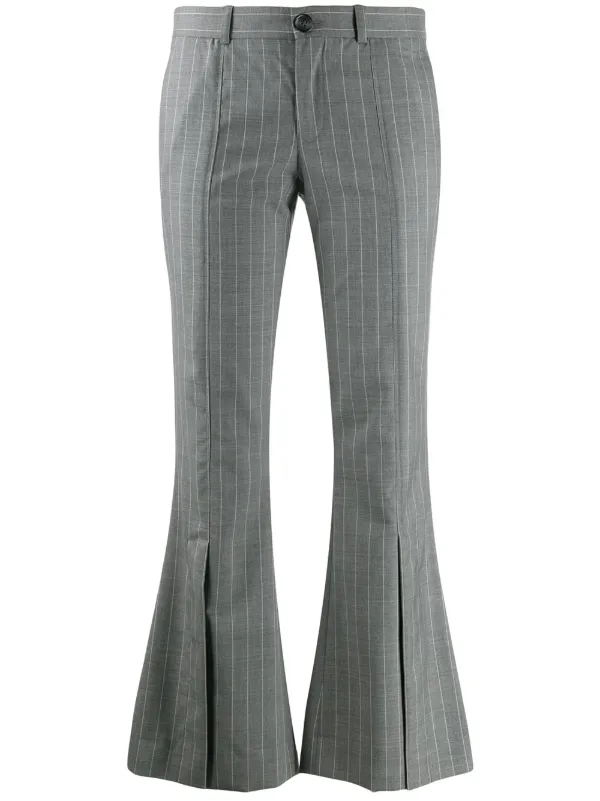 white kick flare trousers