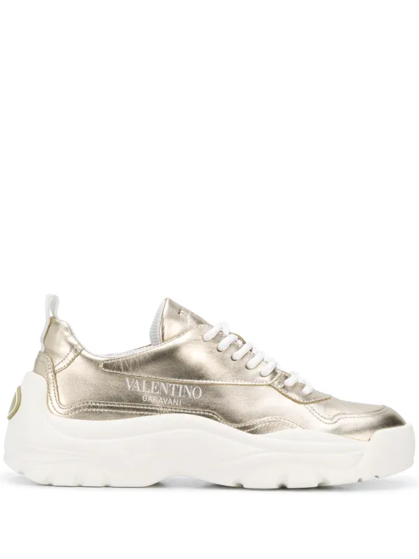 valentino sneakers gold and white