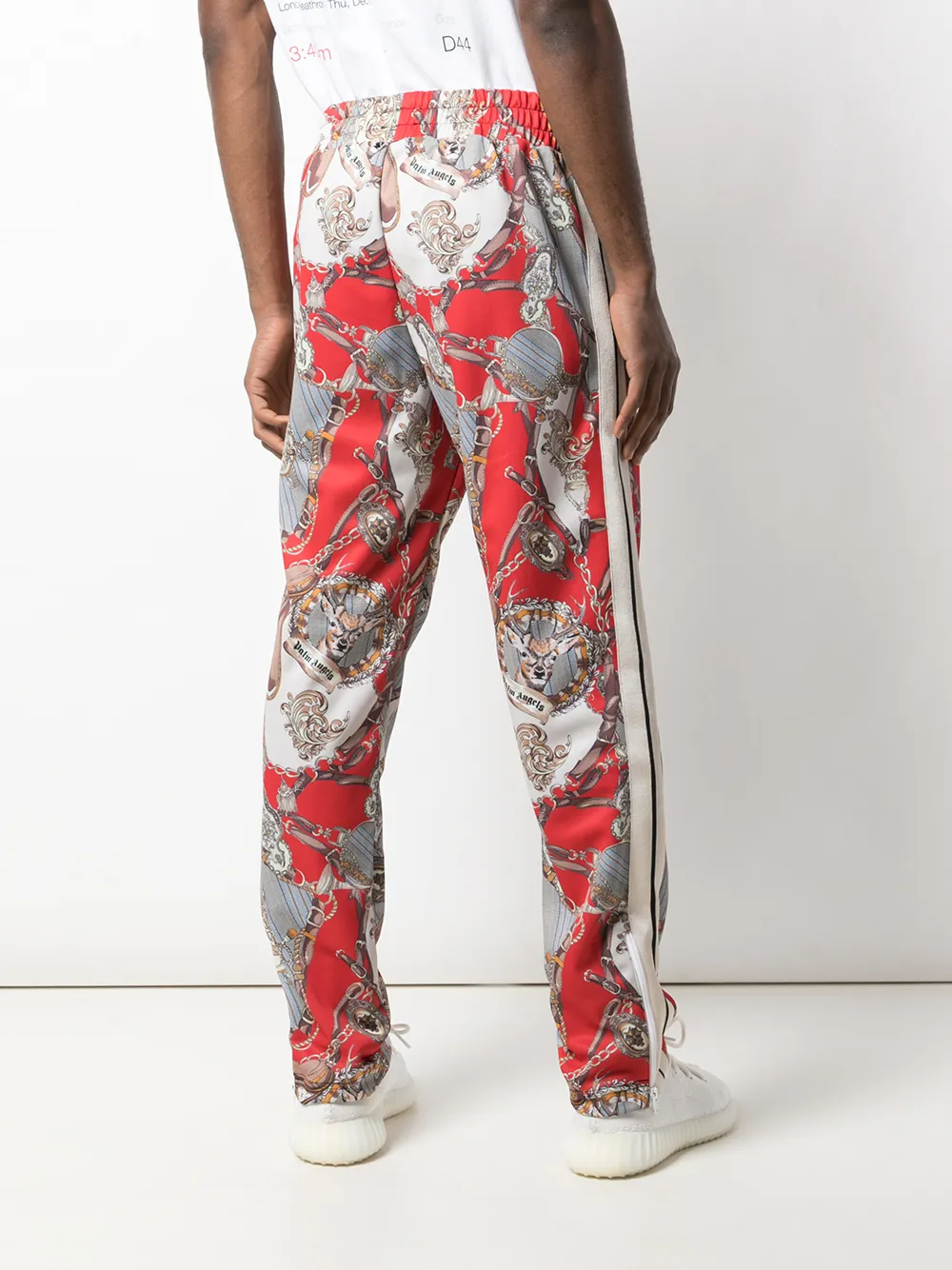 Palm Angels Hot Bridle Track Pants | Red | FARFETCH NZ