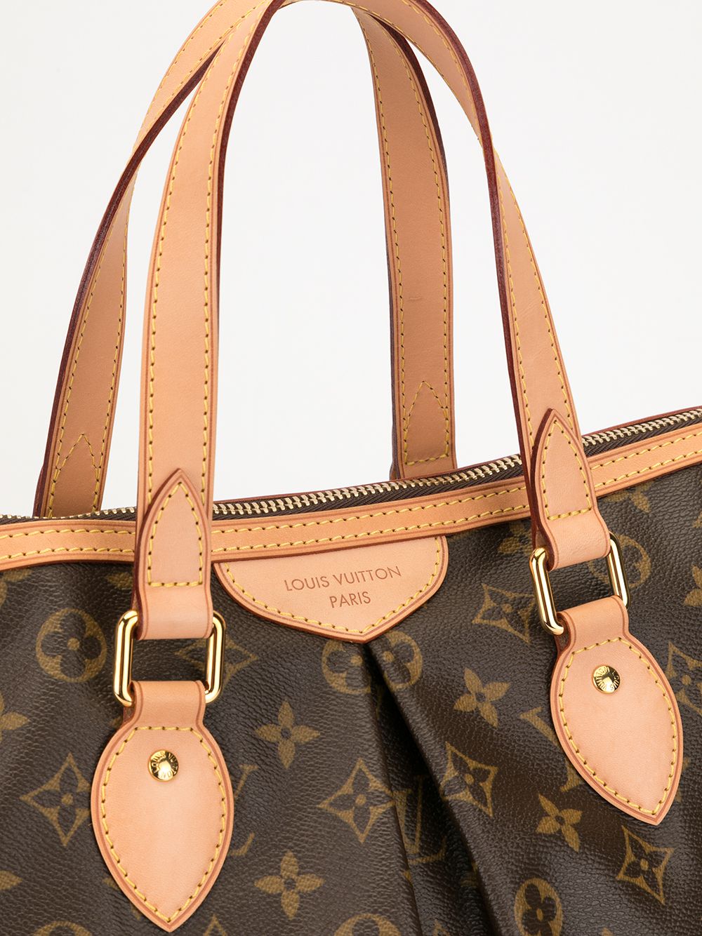 La borsa più piccola al mondo venduta per 63 mila euro: è un clone Louis  Vuitton