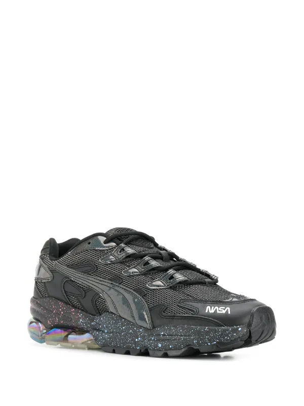 {keywor d} puma nasa hombre