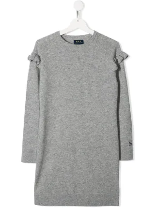 black jumper dress with white frill