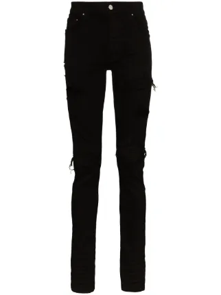 Shop AMIRI MX1 suede patch skinny jeans 