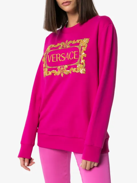 Shop pink Versace logo-print sweatshirt with Afterpay - Farfetch Australia