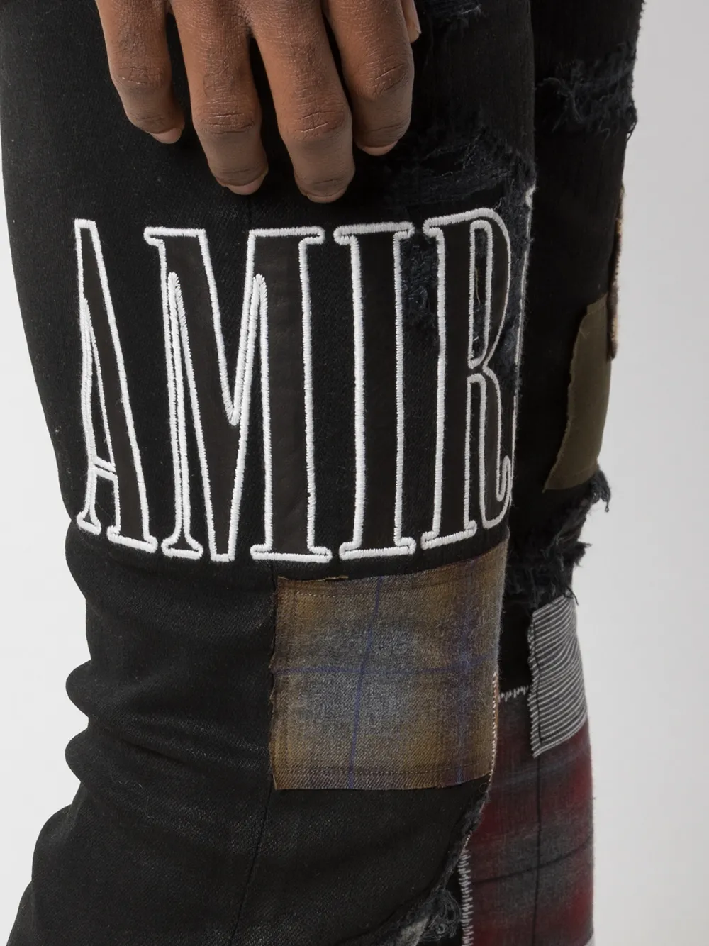 amiri skinny patchwork jeans