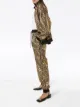 الصورة 2 من Gucci بنطال رياضي بلمعان معدني وشعار