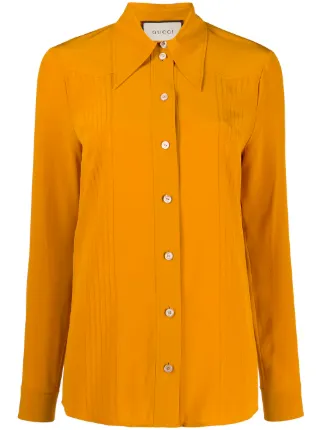 yellow collared shirt