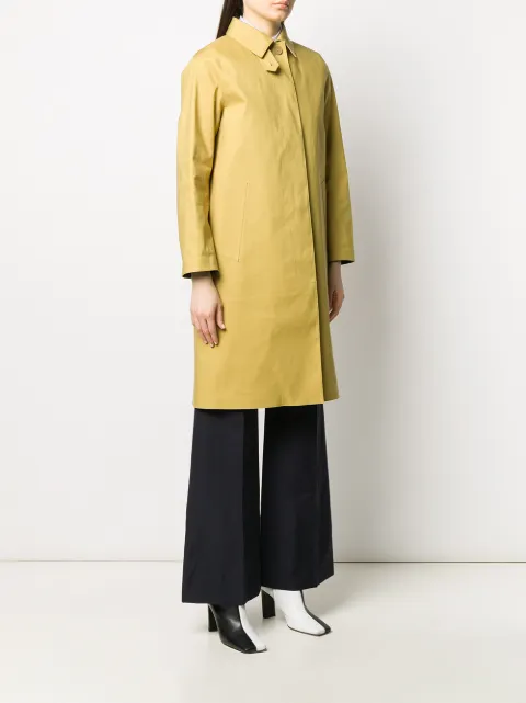 yellow mackintosh coat