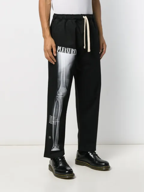 pleasures track pants