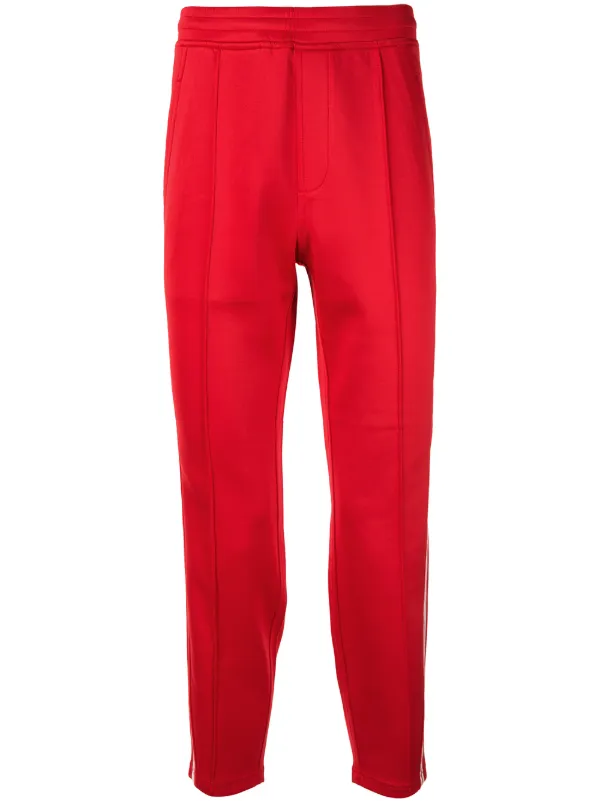 red nylon track pants