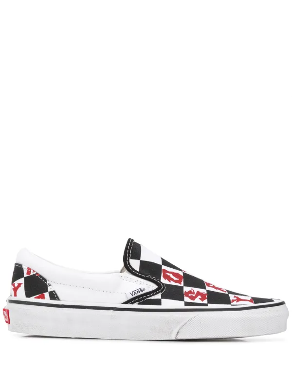vans black and grey checkered slip ons