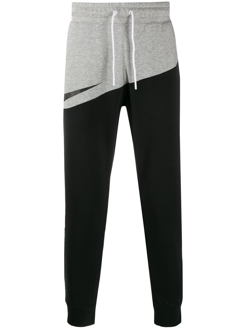 nike swoosh logo cuffed joggers in black