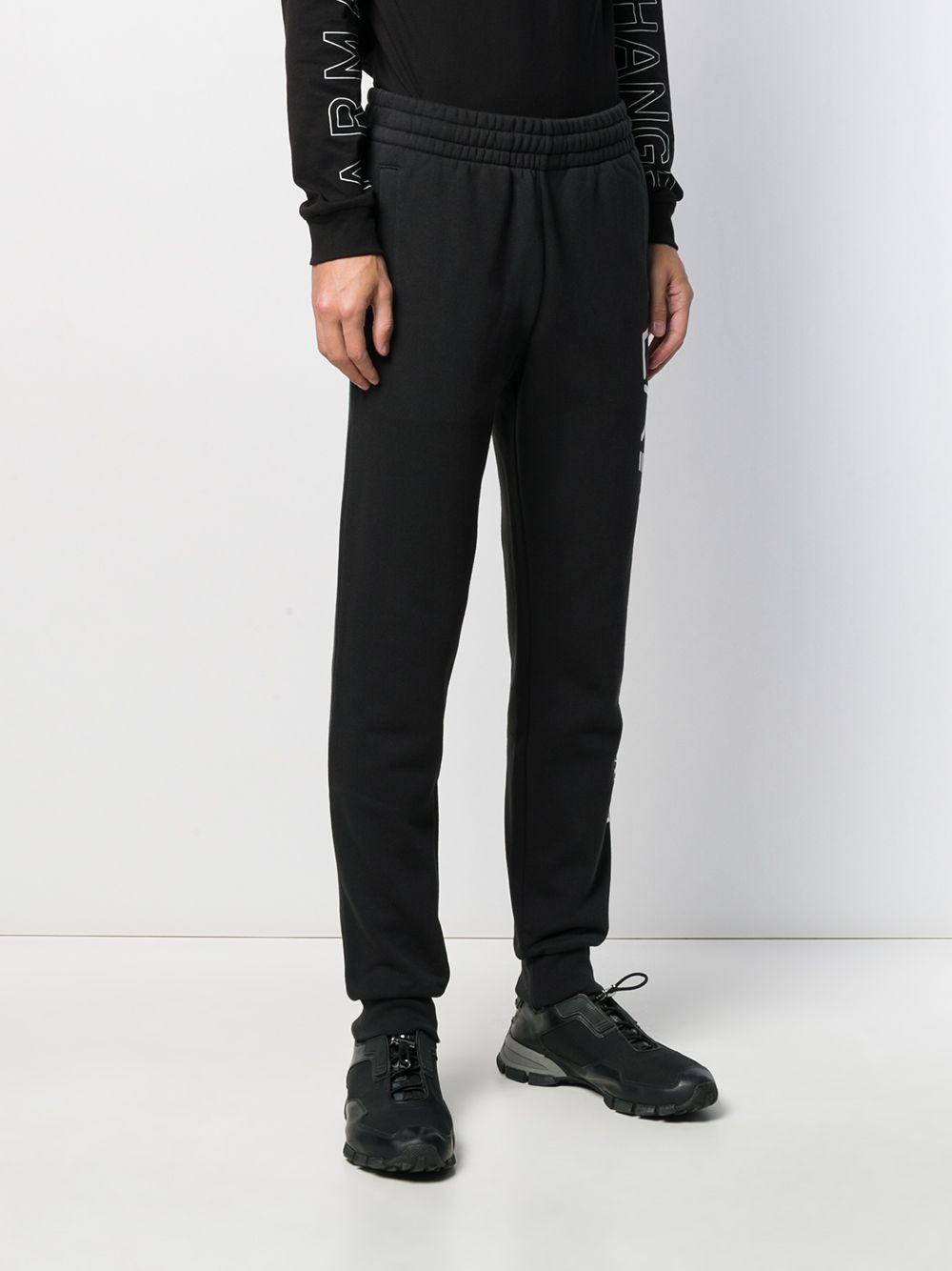 Shop Ea7 Logo Print Track Pants In Black