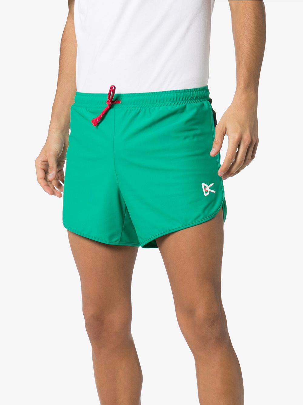 фото District vision green spino logo print track shorts