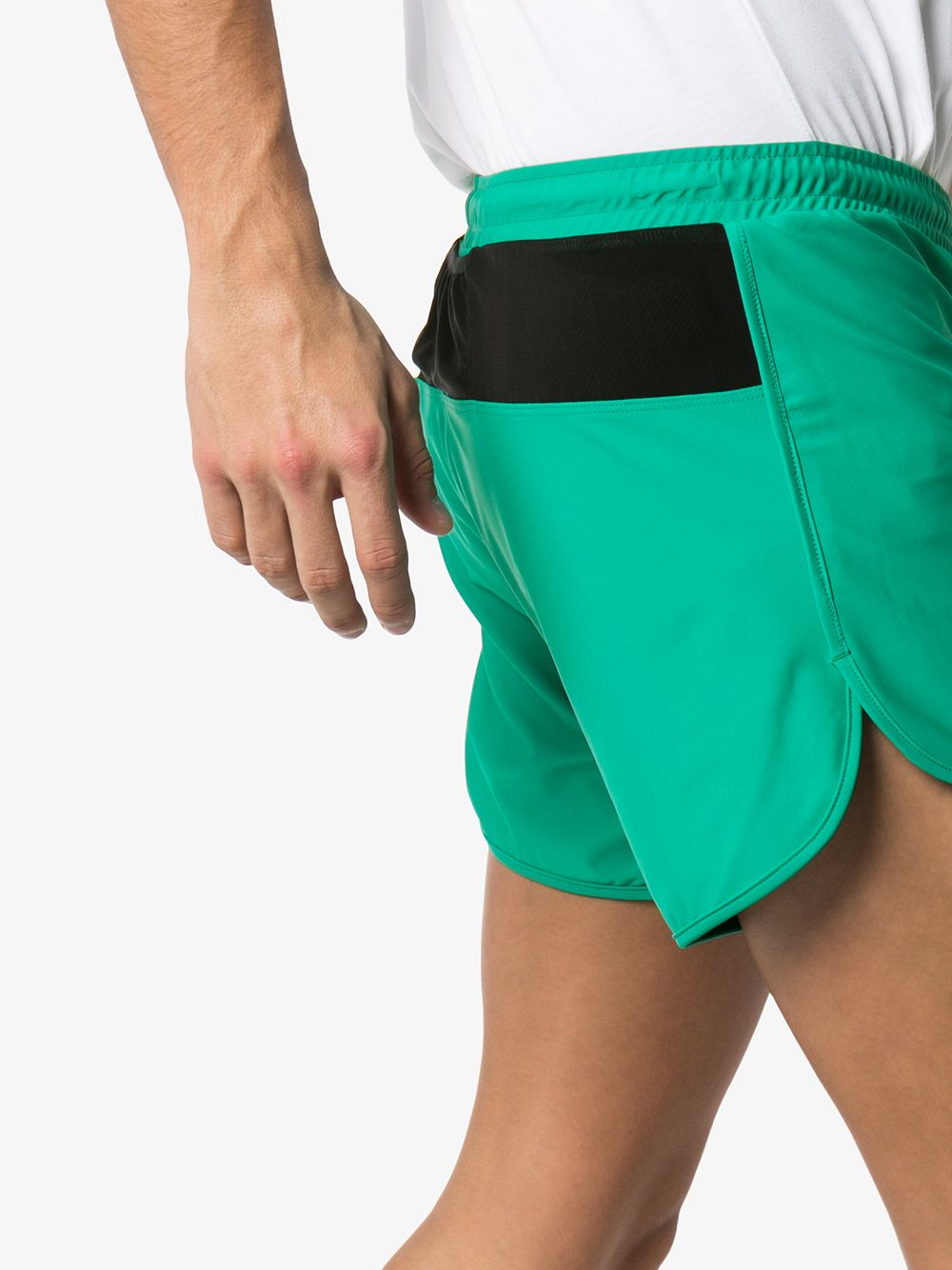 фото District vision green spino logo print track shorts