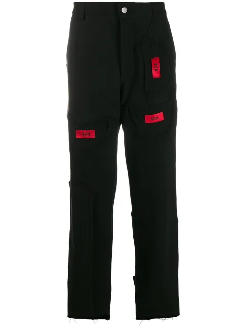 424 contrasting patch logo trousers